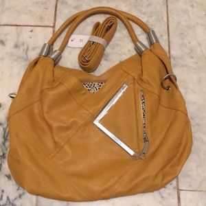 NWT women’s mustard color purse/handbag med size